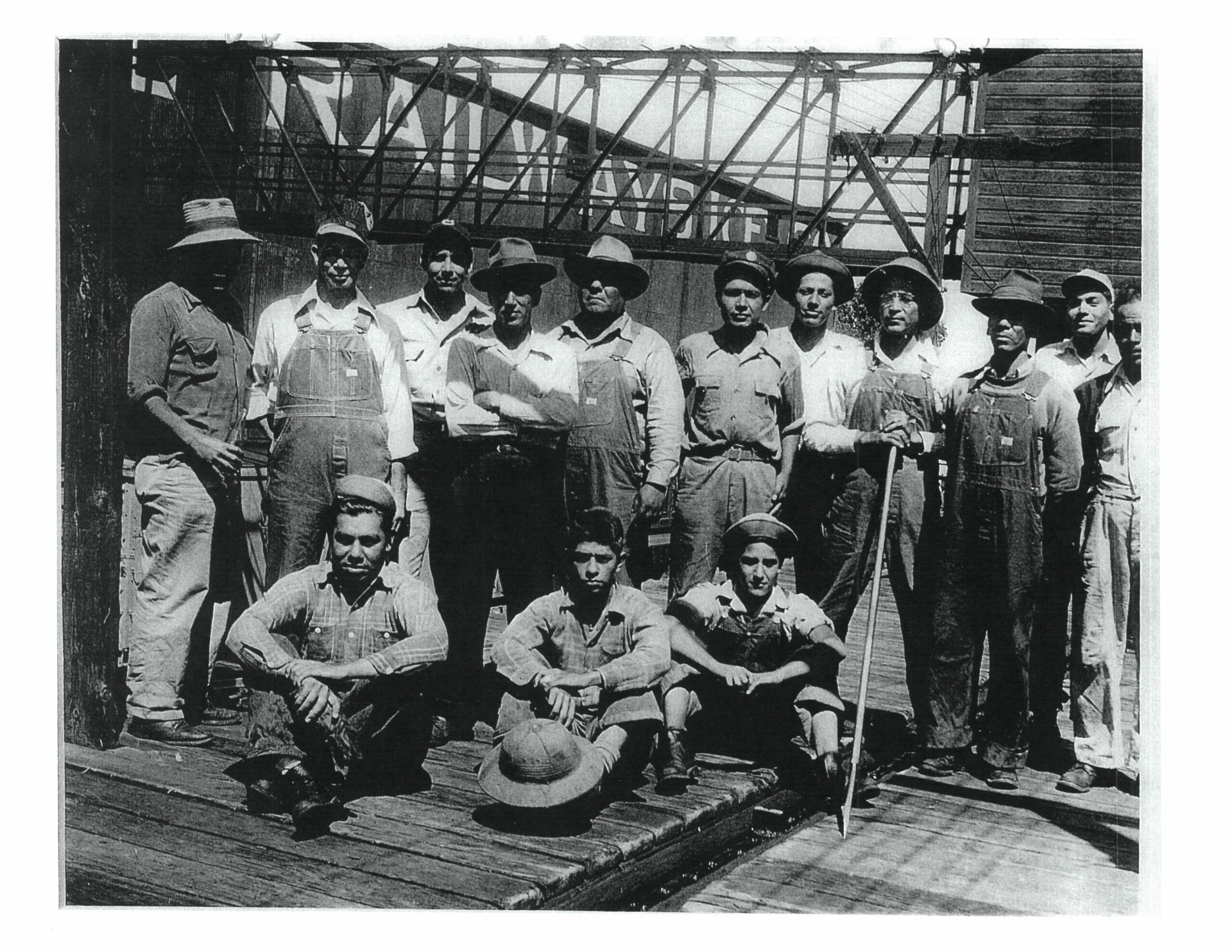 A group of Santa Fe Railway Co. workers. Some were as young as 14 years old and the majority pictured here migrated from Mexico in the 1930s-1940s to find jobs. (Courtesy: Quiroga Family)