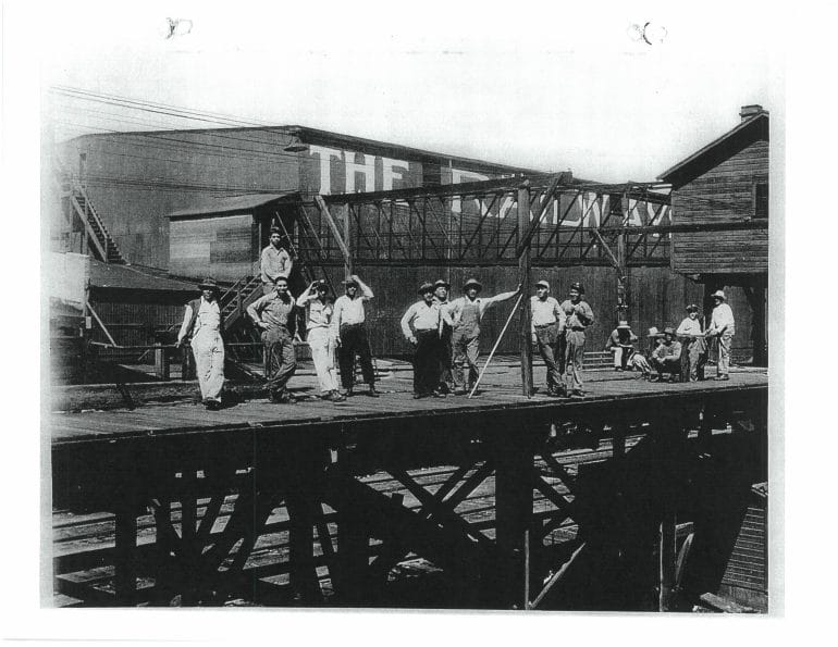 Railway workers strike a pose. (Quiroga Family)