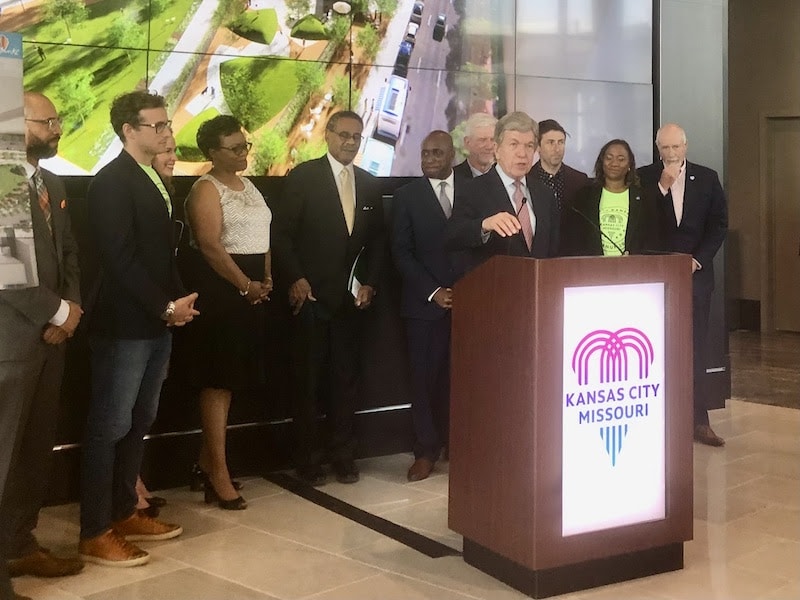 Sen. Roy Blunt, Rep. Emanuel Cleaver and city officials at a press conference.
