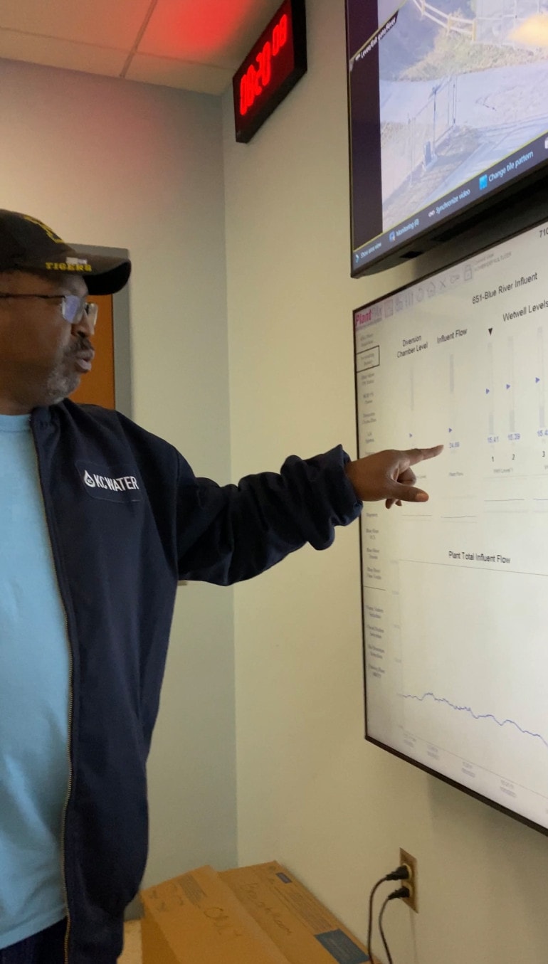 KC Water's chief plant operator Kevin Herman shows how the team tracks and measures how much wastewater has been treated so far. (Vicky Diaz-Camacho | Flatland)