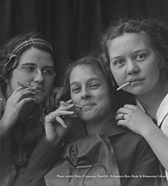 Women smoking in 1909.