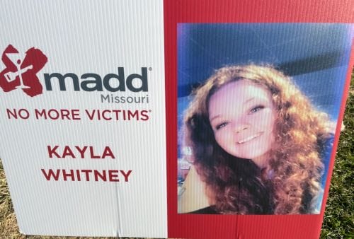 A sign for Kayla Whitney at a MADD Missouri fundraising event.