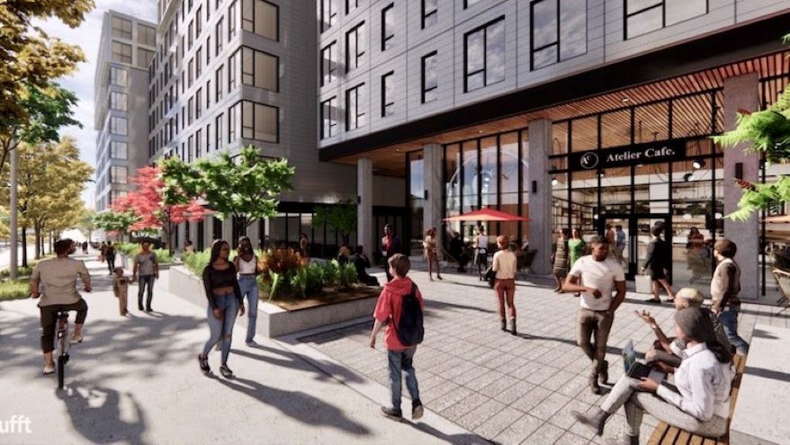 A small plaza is proposed along Main at the midpoint of the new apartment building.
