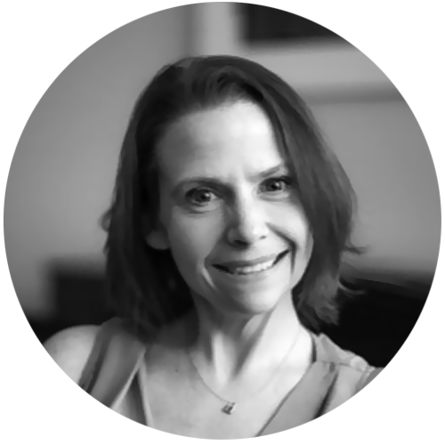 Head shot of woman with short dark hair.