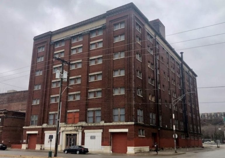 The historic Moline Building at 1015 Mulberry would be renovated into 127 apartments in the first phase of the SomeraRoad plan.