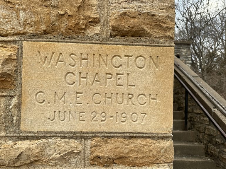 A stone plaque with the date Washington Chapel was established. (Vicky Diaz-Camacho | Flatland)