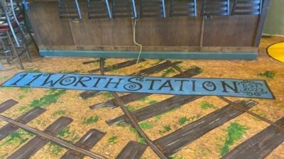 The interior of 11 Worth Station brewery in Leavenworth features railroad tracks painted on the floor.