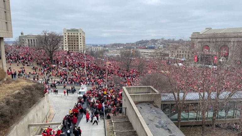 A large crowd assembles in front of Union Station before the start of the Kansas City Chiefs Super Bowl championship parade.