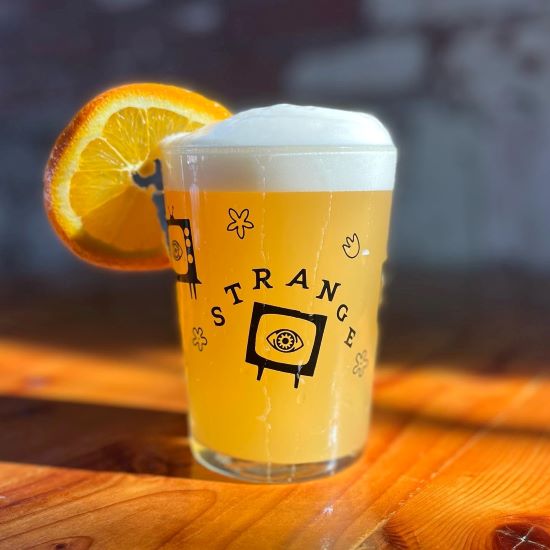 The latest Strange Days brew is a classic witbier with orange zest. (Courtesy | Strange Days Brewing Co.)