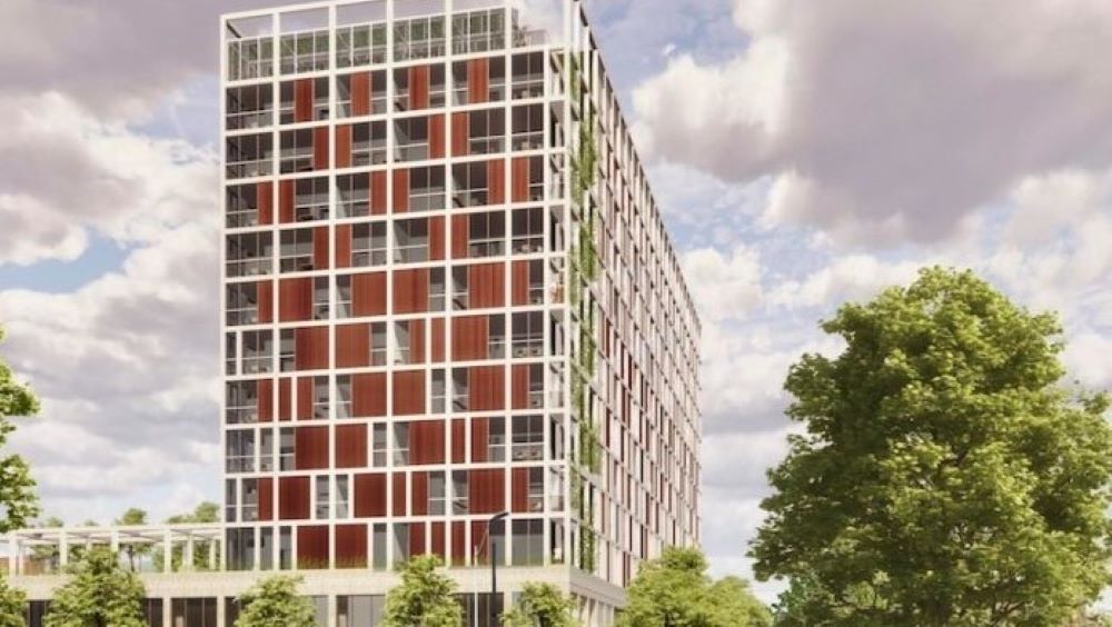 The proposed 13-story City Harvest apartment project would be located on a parking lot immediately west of the City Market.