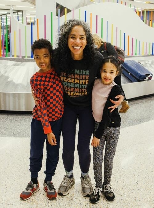 Robynn Nichols with her two children at baggage claim in the new KCI terminal.