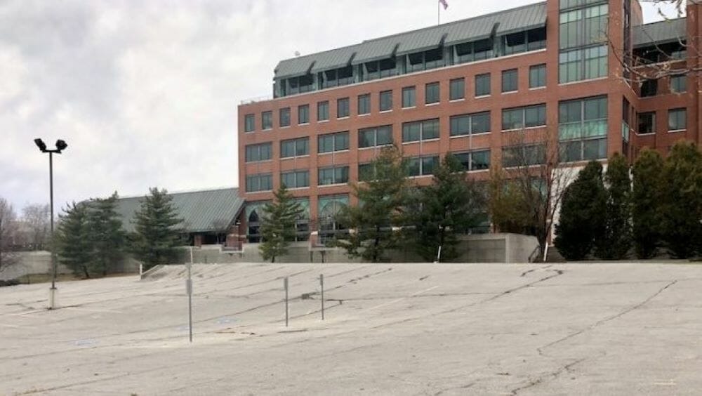 Kansas City Southern headquarters with a city-owned parking lot in the foreground.