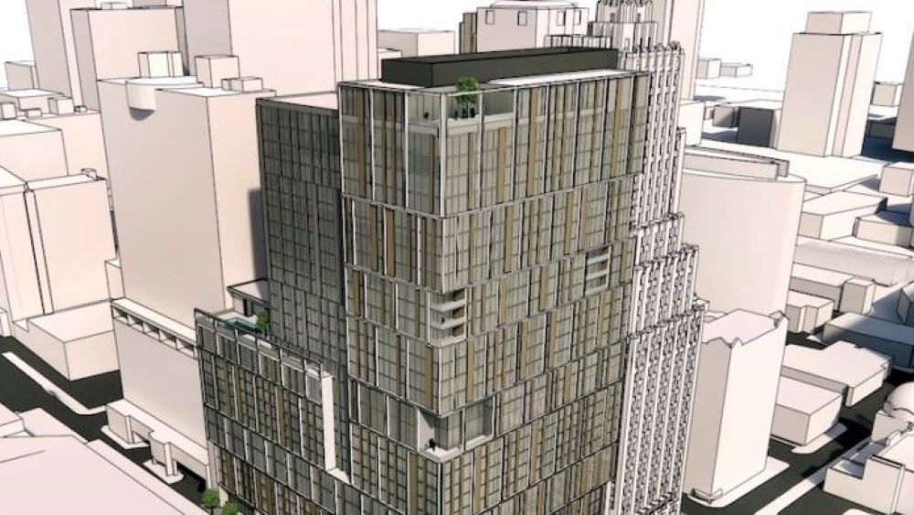 Rendering of a 30-story apartment and hotel building next to the historic Power & Light Building.