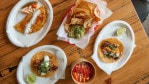 A variety of dishes from Tacos Valentina.