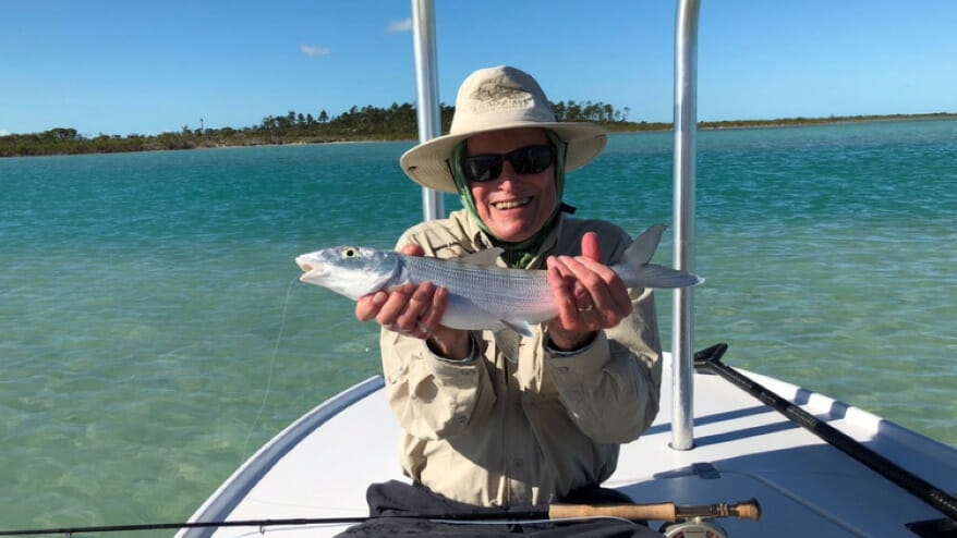 Bert Berkley displays a fish he caught.