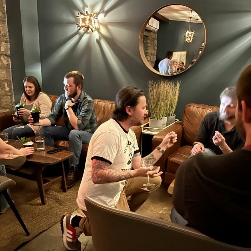 Jay Sanders talks to a guest during the sold-out event Foraging for Cocktails.