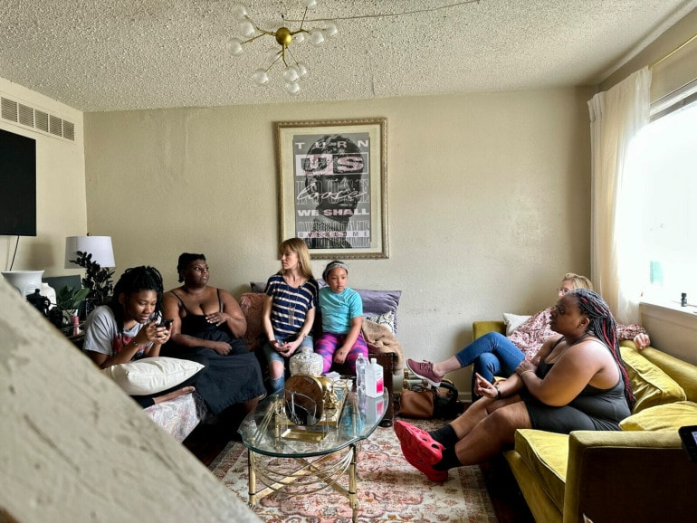Tenants have been meeting to discuss efforts to improve living conditions at Blue Valley Court Townhouses.