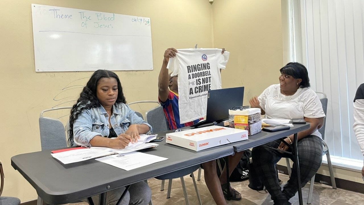 T-shirts being printed by the local Liberian organization proclaim the message that has articulated the outrage in the aftermath of the shooting of teenager Ralph Yarl. Pictured left to right are Rona Roberts, Nat M. Pombor-Tulay and Queen Taibetha S. Dargbe.