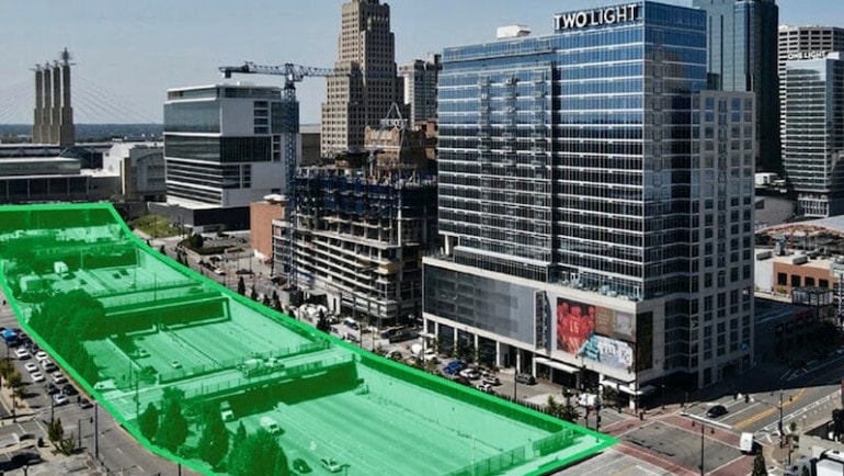 Rendering shows the four blocks of the downtown freeway loop that would be covered with a deck that would create a public space.