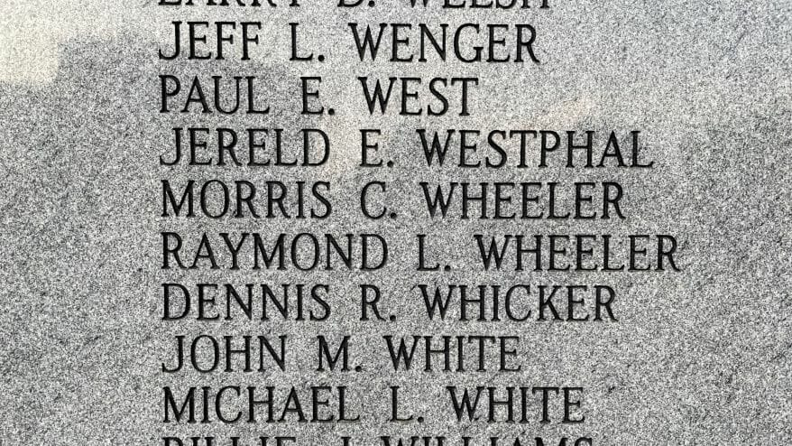 Names of veterans are etched into the granite wall at the Vietnam Veterans Memorial Fountain in Kansas City.