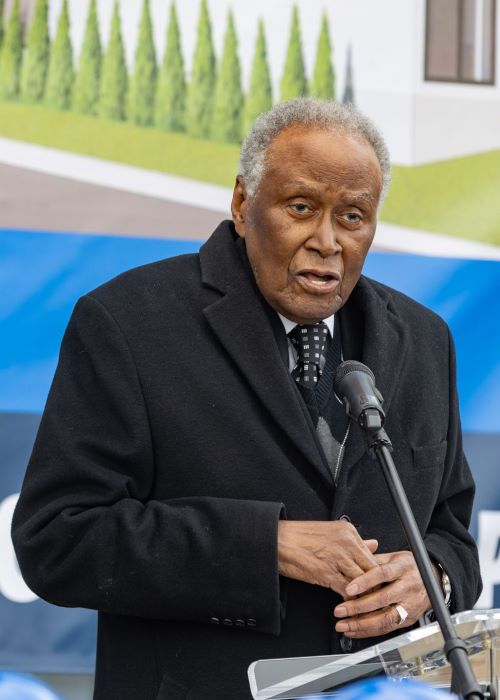 Alvin L. Brooks speaking at a podium.