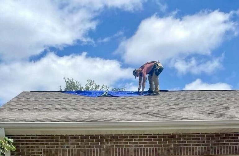 Roofer Rylan Martin working in extreme heat.