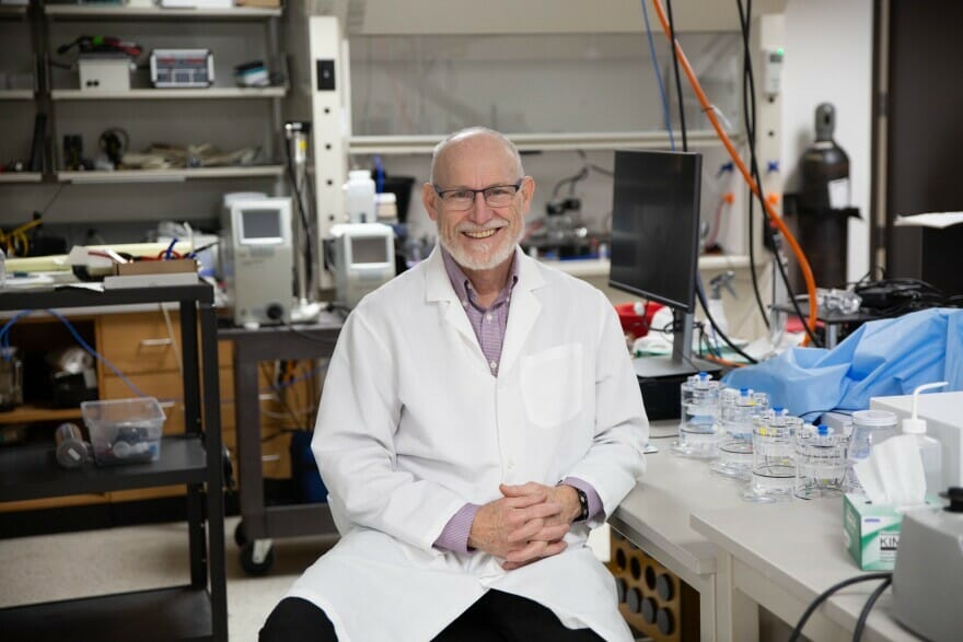 Prof. Peter Thorne, The University of Iowa, a lab setting.