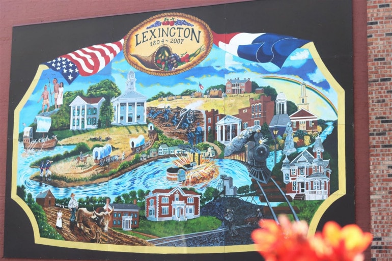 A brightly colored mural shows elements of Lexington's history.