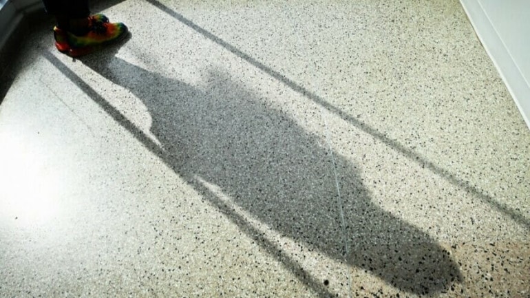 A woman's shadow on the floor.