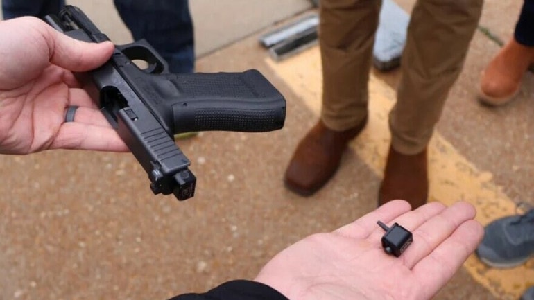 A gun with a "switch" to make it an automatic weapon.