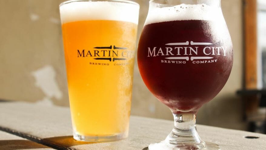 Glasses of Pineapple Mango Sour and Purple Passion from Martin City Brewing Co.