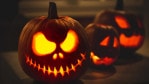 Three scary Halloween pumpkins.