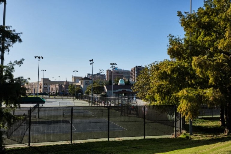 The tennis courts at the east end of the Country Club Plaza offer one potential site for future development.