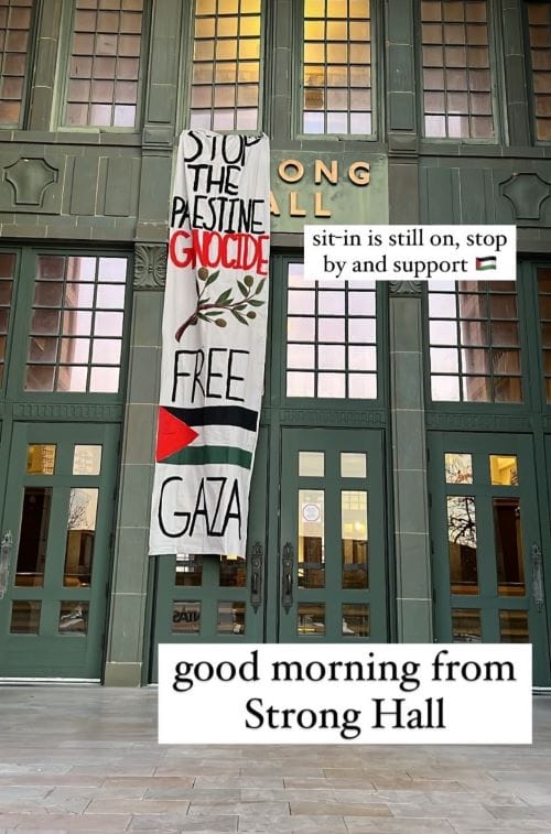 A sign hung in support of Palestinians that was hung at Strong Hall at the University of Kansas.