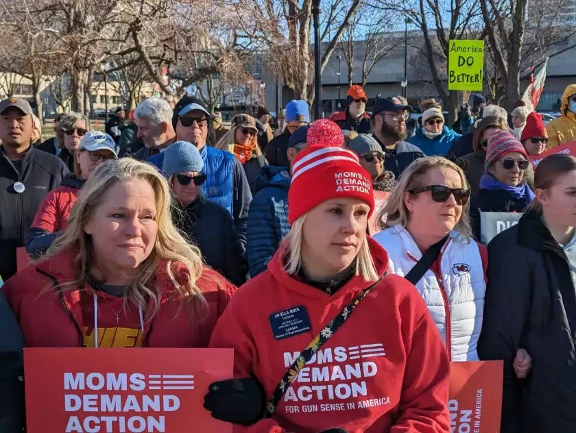 Kansas Rep. Jo Ella Hoye (in a stocking hat) was among those attending a rally on Feb. 17 following the shootings after the Super Bowl rally.