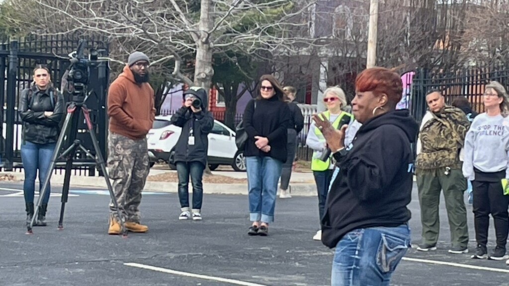 Rosilyn Temple addressed the group that gathered for a vigil on Feb. 19, one day before two men would be charged with felony murder in the death of Lisa Lopez-Galvan, who died as one of the victims of the mass shooting after the Chiefs' Super Bowl victory parade.