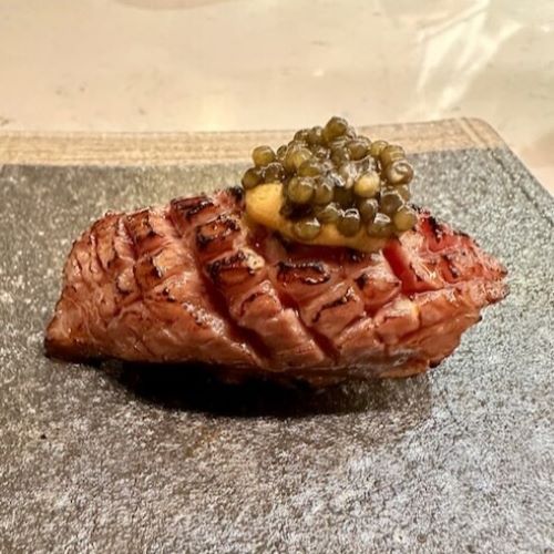 A5 wagyu strip loin from Hiroshima lightly torched then topped with a pat of sea urchin butter and buttery Beluga caviar is a uniquely Midwestern twist on sushi.