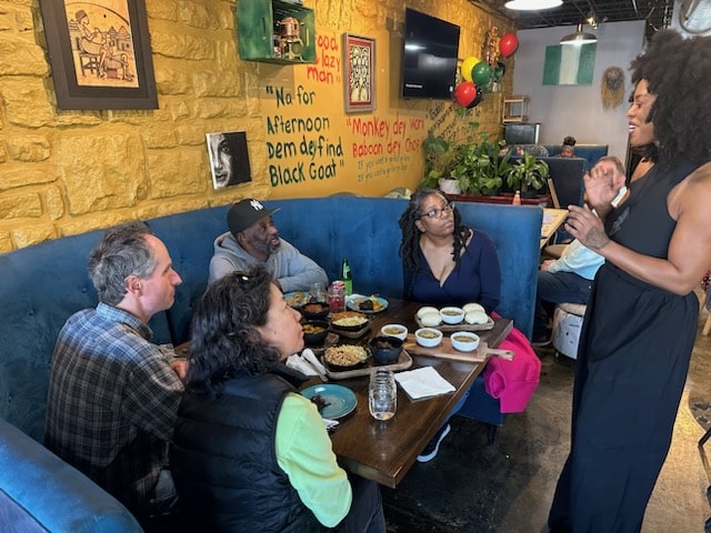 Tanyech “Tan” Yarbrough visits with customers at Wah Gwan.