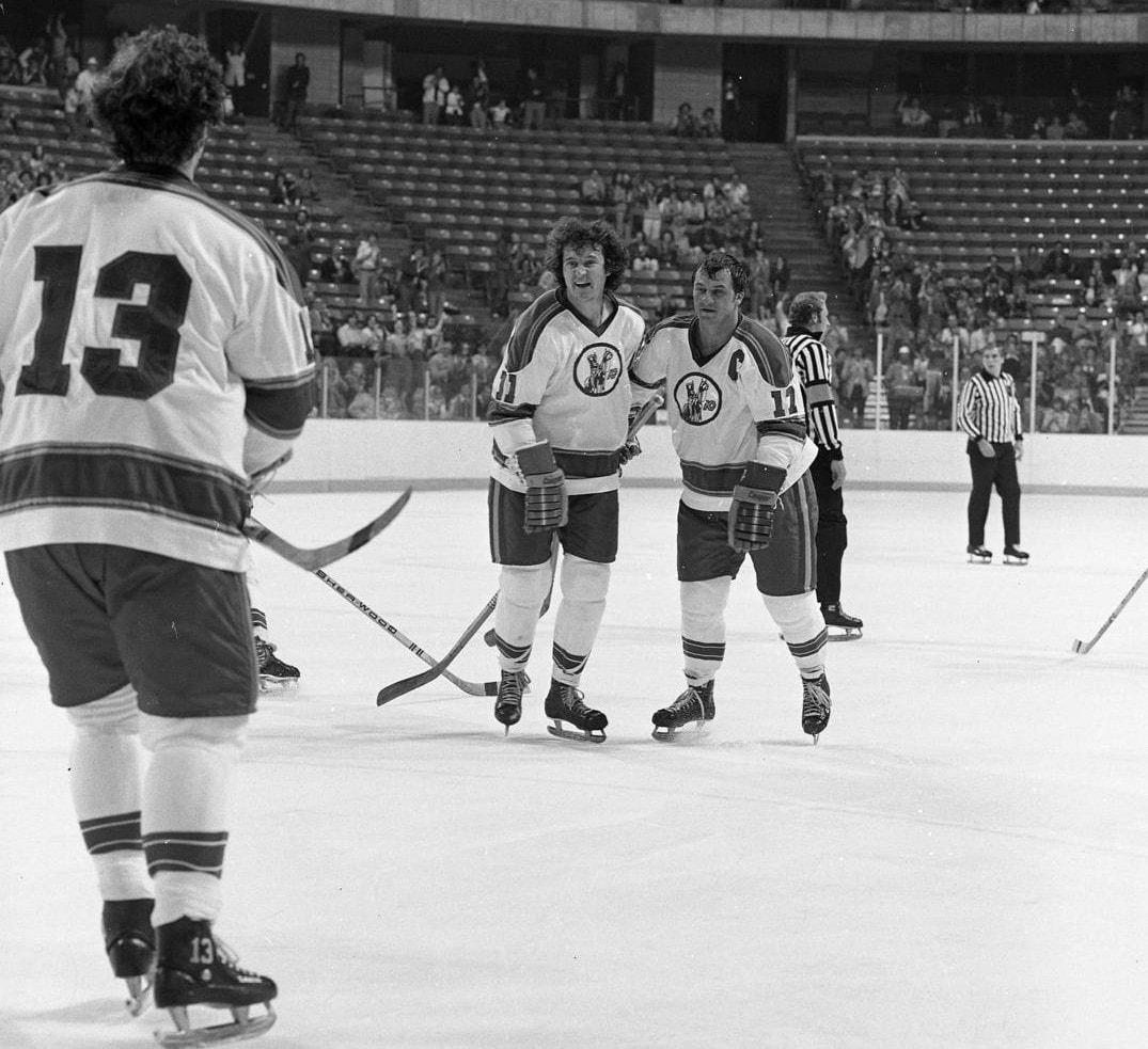 Kansas City Scouts hockey players on the ice.