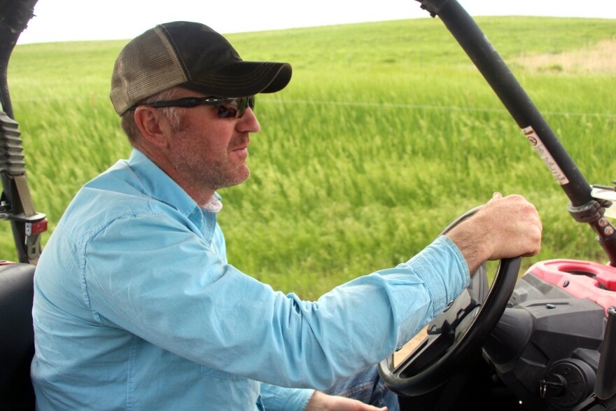 Daniel Mushrush sitting on a tractor.