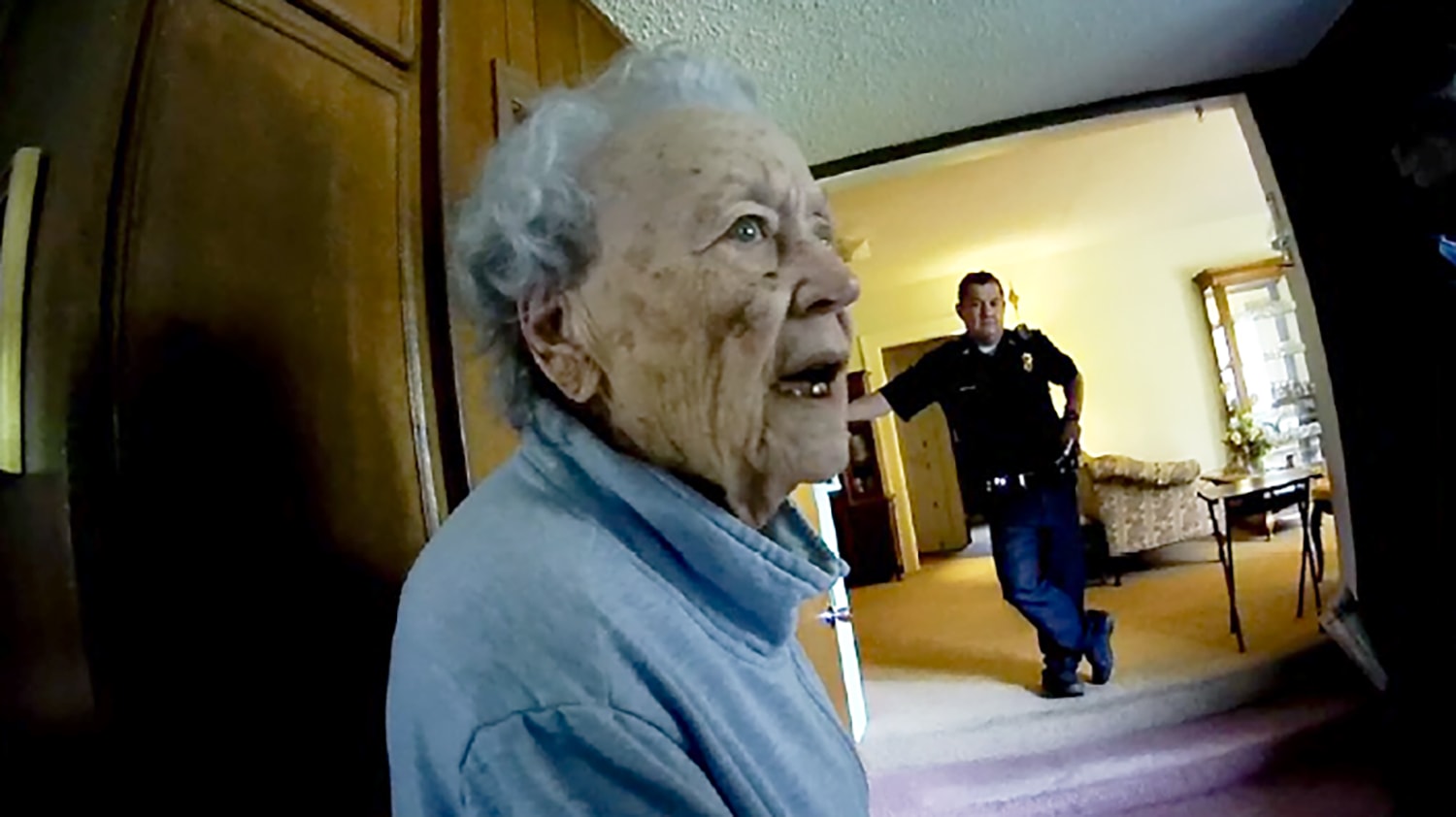Joan Meyer, the 98-year-old co-owner of the Marion County Record, was defiant as police Chief Gideon Cody, seen the background, and other officers raided her home. She died the following day.