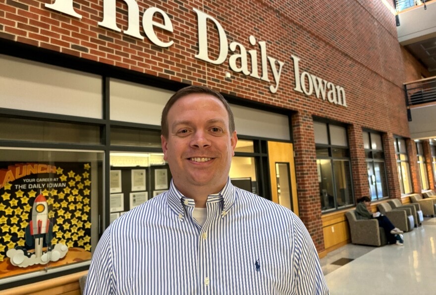 Publisher Jason Brummond, standing outside his office at The Daily Iowan on the University of Iowa campus in Iowa City. The student newspaper is published by the non-profit Student Publications, Inc., and is independent from the university.