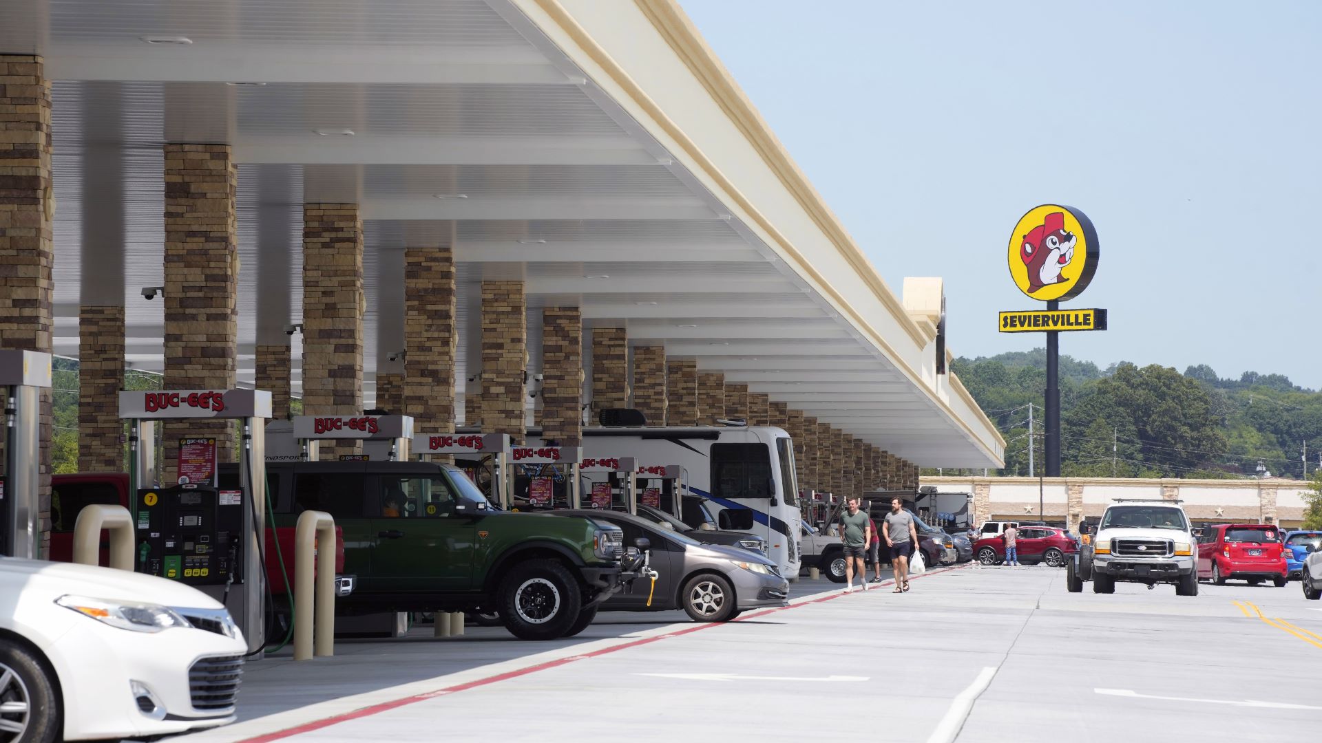 Cars and trucks fuel up at a massive Buc-ee's gas station and convenience store.