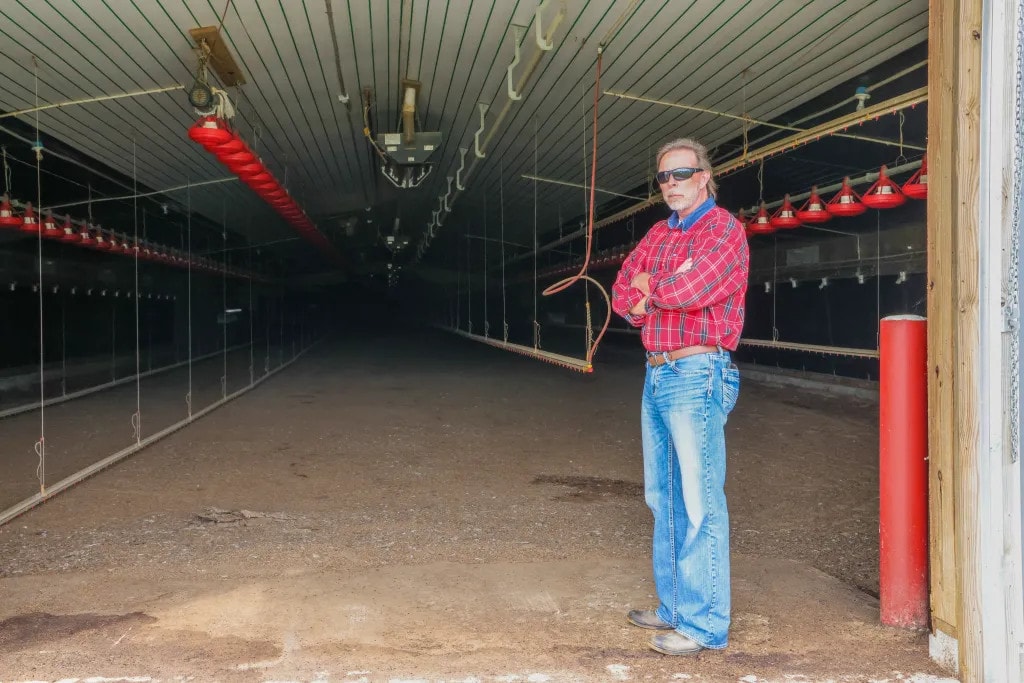 Preston Arnold on his farm near Sikeston, Missouri, where he raised chickens.