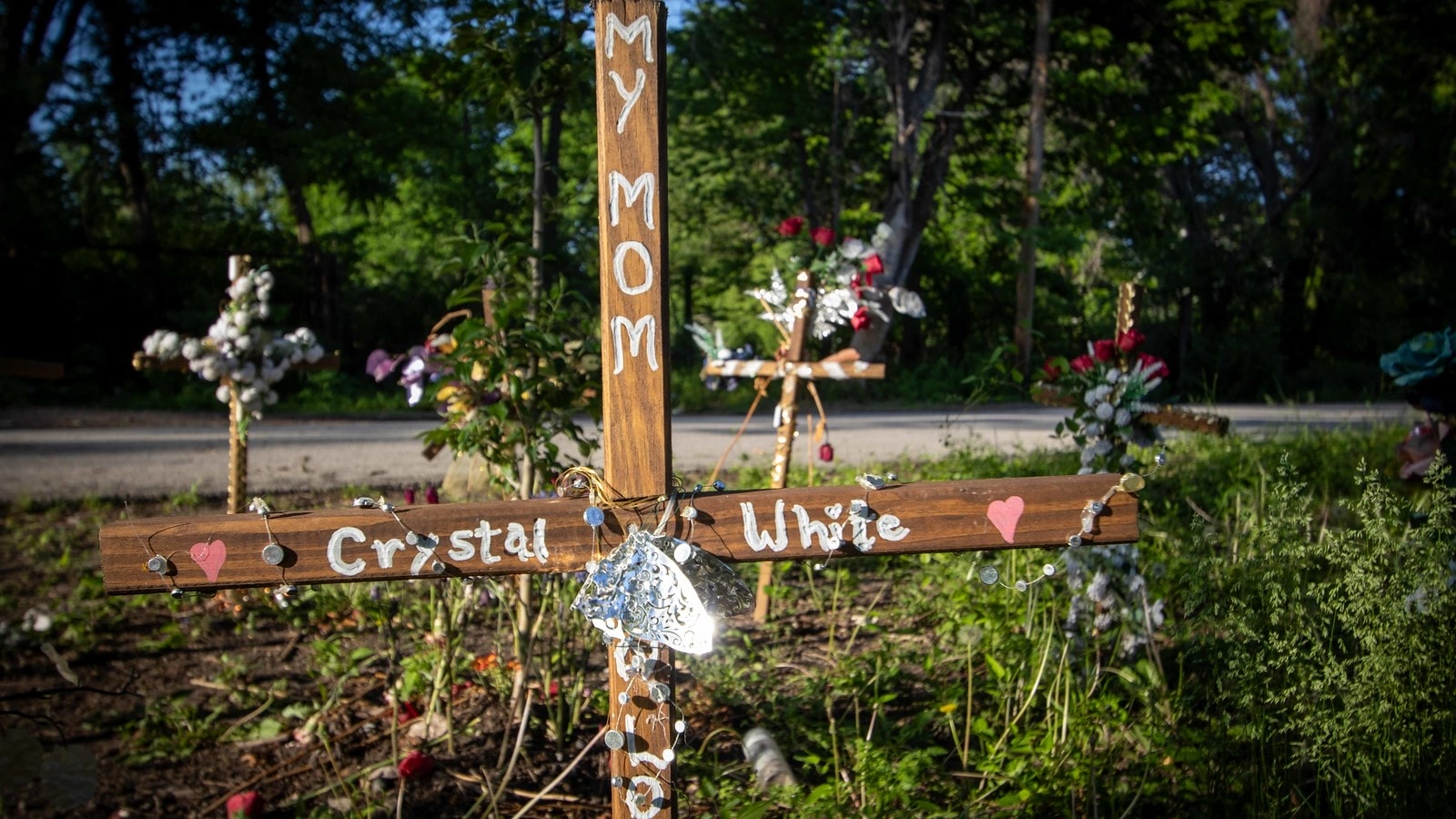 A memorial for Crystal White, a former resident of Lawrence's sanctioned camp who died there.