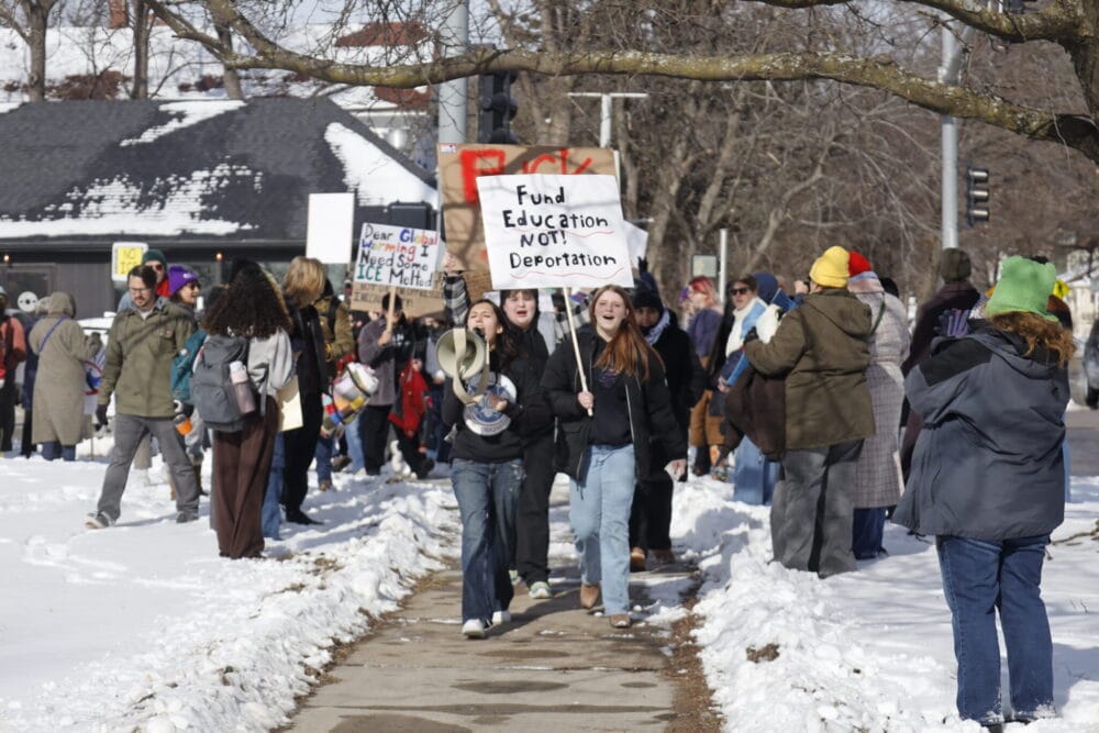 Lawrence High School students and residents protest Immigration and Customs Enforcement on Jan. 27, 2026, at 19th and Louisiana Street across from the high school. (Photo by Maya Smith for Kansas Reflector)